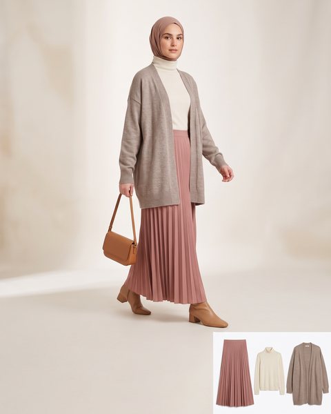 Flowing pleated maxi skirt with a fitted turtleneck and oversized cardigan, styled for university