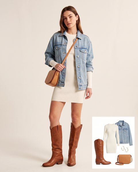 Woman wearing cognac leather western knee-high boots with an ivory knit mini dress, a light-wash denim jacket and a tan leather crossbody bag
