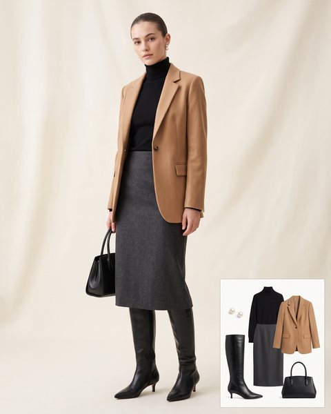 Woman wearing black pointed-toe kitten-heel knee-high boots with a charcoal pencil midi skirt, a black turtleneck, a camel blazer and a black top-handle bag