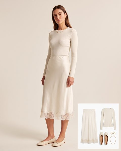 Ivory silk slip midi skirt with a delicate lace-trimmed hem, fitted ribbed knit top, cream ballet flats and gold jewelry