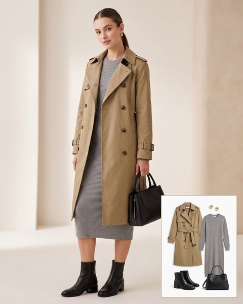 Woman wearing a khaki trench coat over a grey ribbed midi sweater dress with black ankle boots and a black top-handle bag